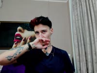 Hey there, I’m Kenny — your blue-eyed brunette with irresistible tomboy swagger and a body laced in ink that tells a thousand stories. My wild, artistic soul thrives on adventure and creativity, and I’m addicted to expressing myself in ways that are bold, mischievous, and just a bit dangerous.Art is an obsession, my mind bursting with wild ideas, fantasy designs, and things that might make you blush if you look too close.Tattoos are my passion, every inch of ink you see on my skin is a secret story or rebellion I’m just waiting to reveal. Some are cheeky, some are intimate, and a few… well, maybe you’ll earn a private viewing.My style is confidently casual, I feel most alive in clothes that let me move, tempt, and tease at will. My favorite outfits snap off just as easily as they slip on, whether we’re chilling with music or things start getting a little steamier.What to Expect With Me:Wicked laughter and playful banter that blurs into something sexier the longer we talk.Flirting and teasing that goes from cheeky to daring, always keeping things light but with a pulse that grows hotter by the minute.Moments of real connection—genuine talks about passions, wild daydreams, and creative fantasies I’d love to explore with the right partner.Naughty surprises: I love to bring a little chaos, a lot of pleasure, and just enough naughtiness to keep you guessing.